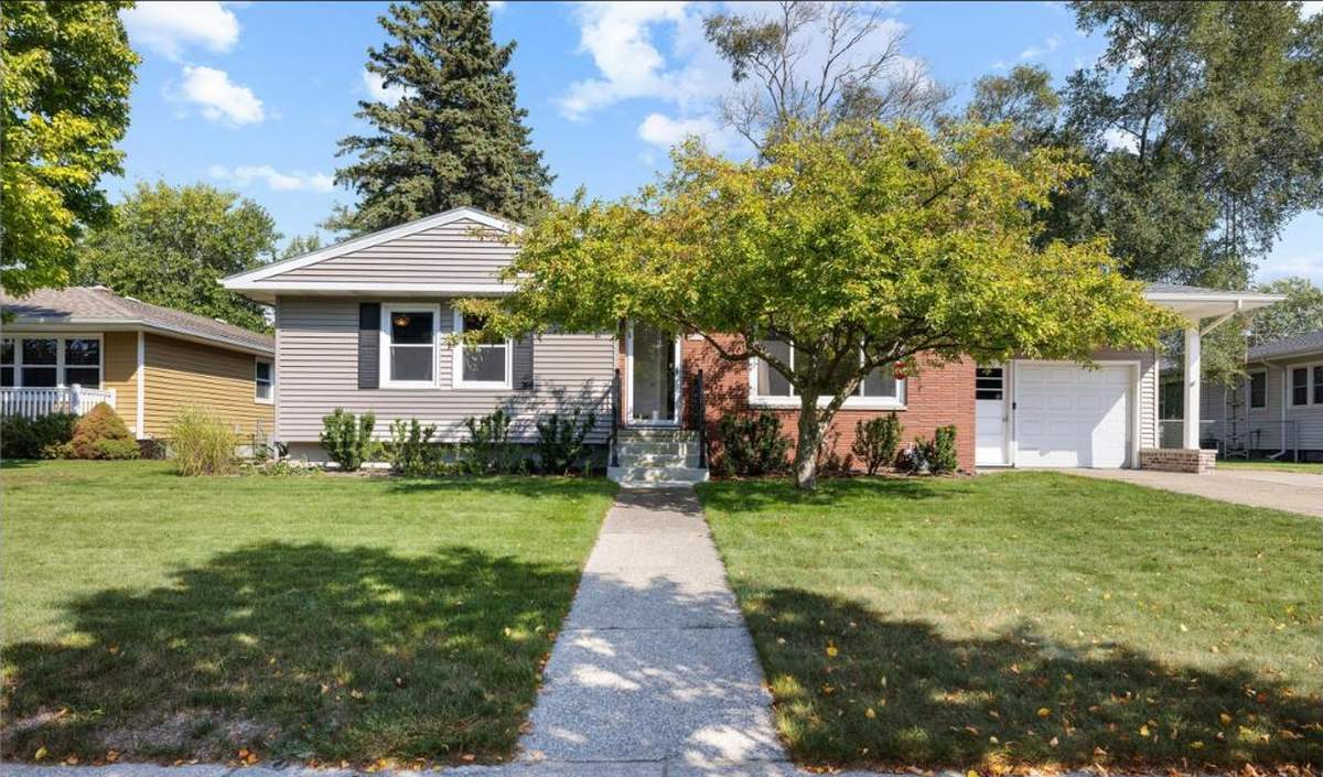 Reverse mortgage in Grand Haven, MI: a typical single-level home, about 1650 sq ft, built around 1961
