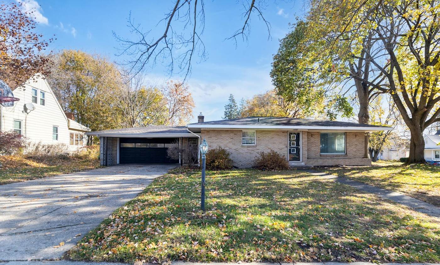 Reverse mortgage in Grand Rapids, MI: a typical single-level ranch home, about 1412 sq ft, built around 1953