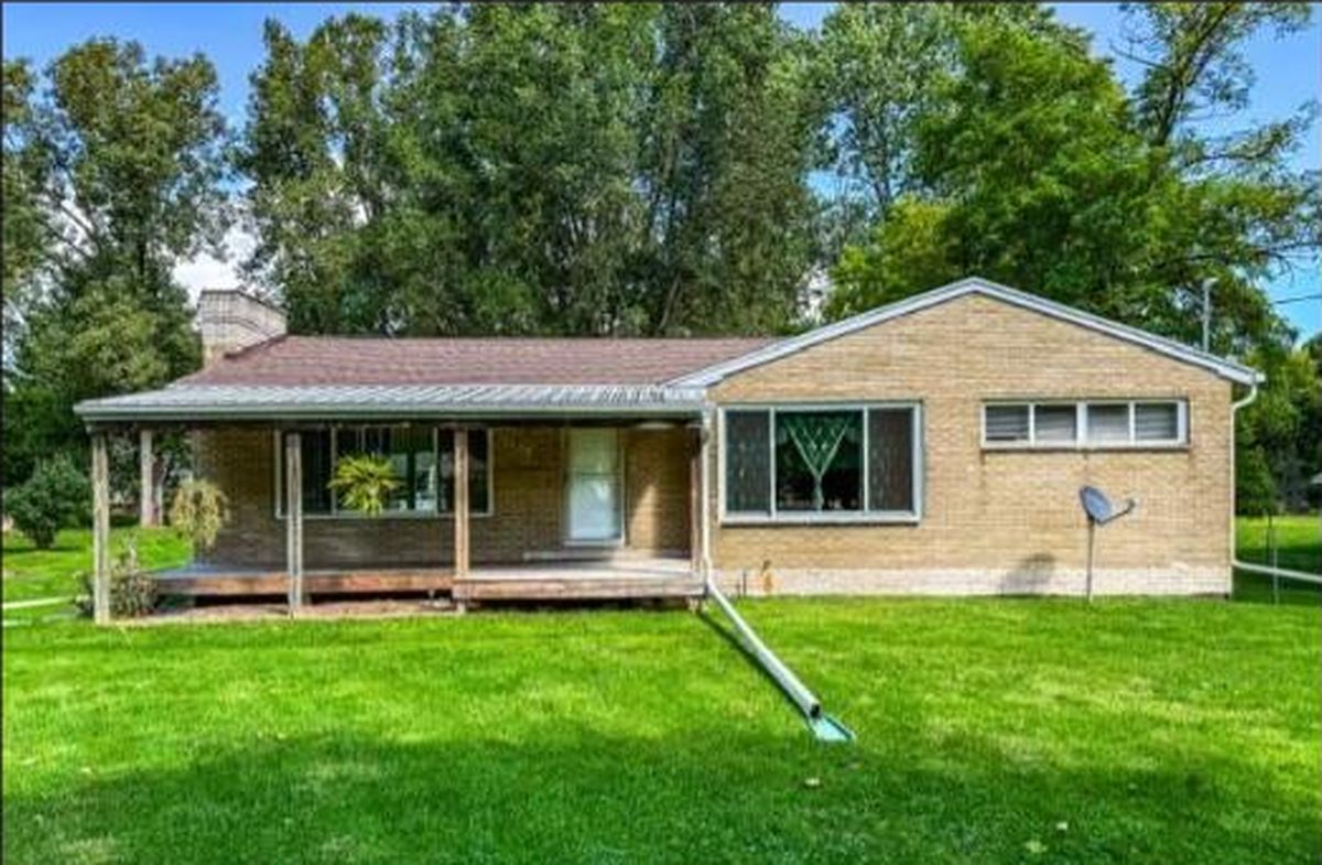 Reverse mortgage in Lansing, MI: a typical single-level home, about 1300 sq ft, built around 1959