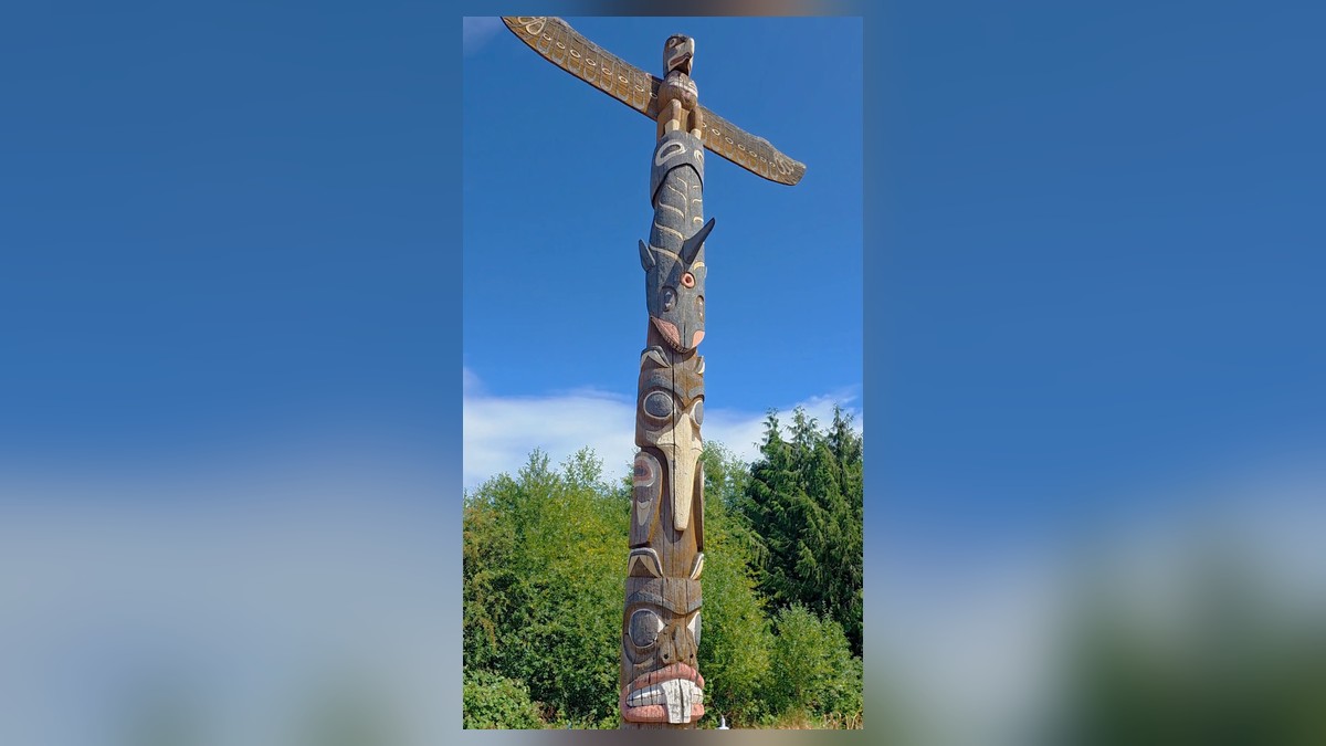 The 18-foot cedar totem pole at Rotary Viewpoint Park in West Seattle, carved by Robin Young in 1976