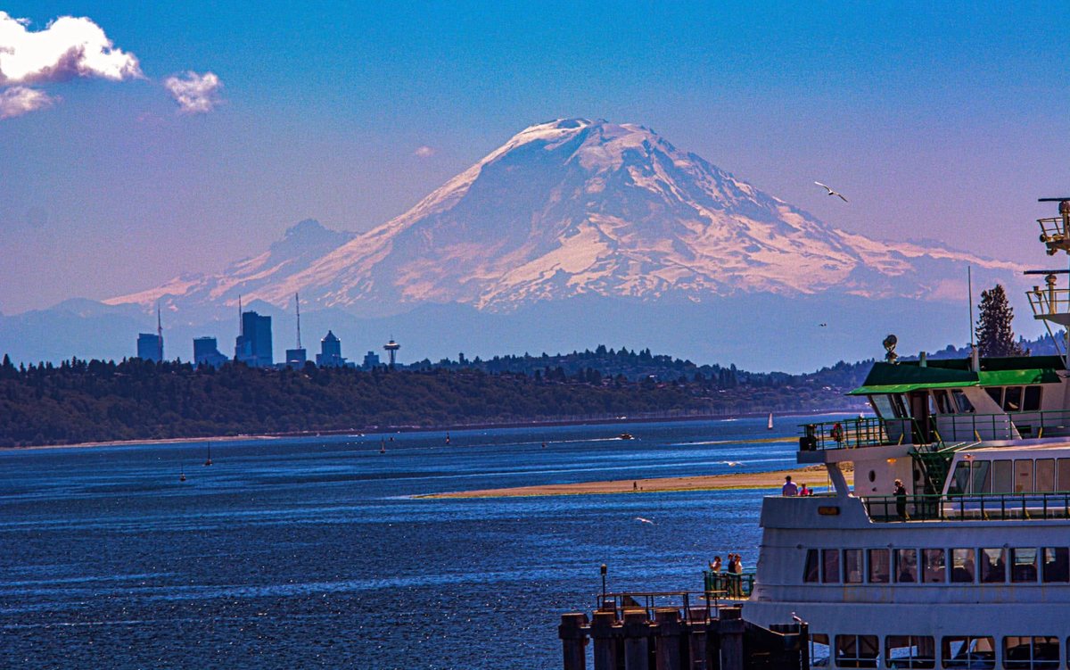 Reverse mortgage in Washington State: Mount Rainier and a Washington State ferry on Puget Sound with the Seattle skyline